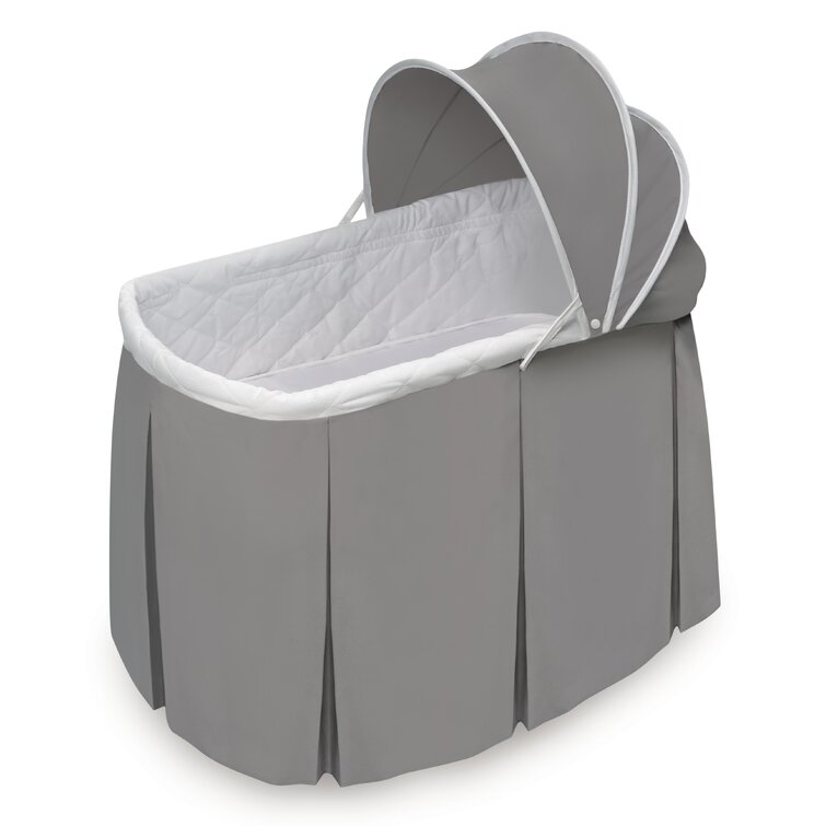 Wishes oval store rocking baby bassinet